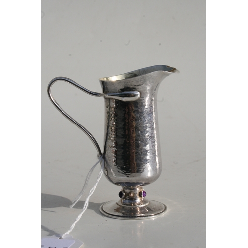 159 - A Guild of Handicraft Arts & Crafts silver cream jug designed by Charles Robert Ashbee, decorated wi... 