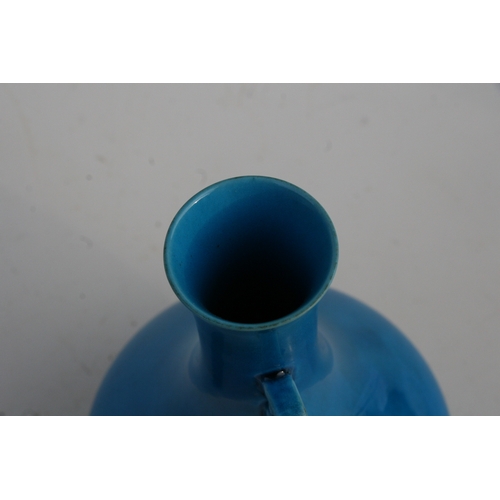 514 - A Chinese turquoise glaze two-handled vase with impressed seal mark to the underside, on a pierced h... 