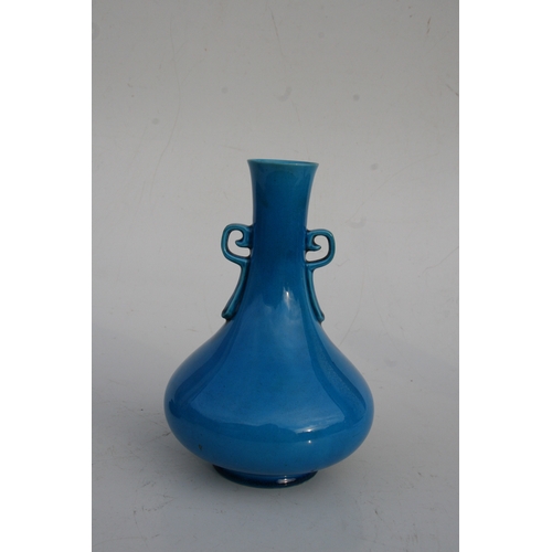 514 - A Chinese turquoise glaze two-handled vase with impressed seal mark to the underside, on a pierced h... 