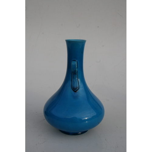 514 - A Chinese turquoise glaze two-handled vase with impressed seal mark to the underside, on a pierced h... 