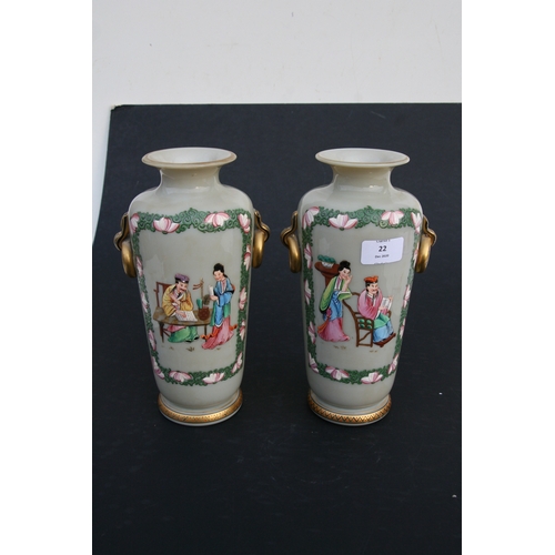 22 - A pair of French opaline glass vases decorated in the Chinese manner with figures. 25cm ( 9.75 ins) ... 