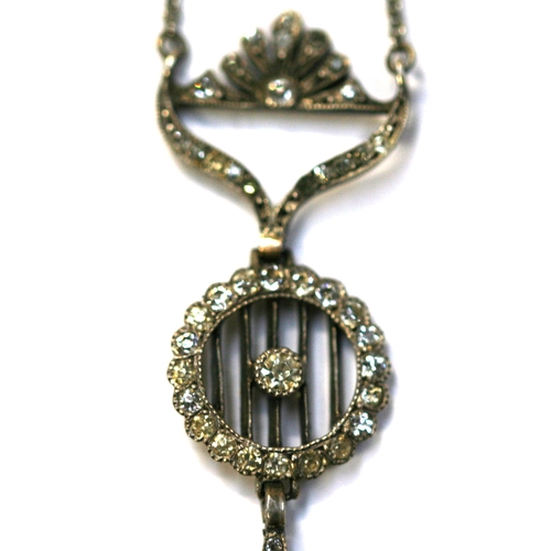 213 - An Edwardian silver necklace with paste set pendant.