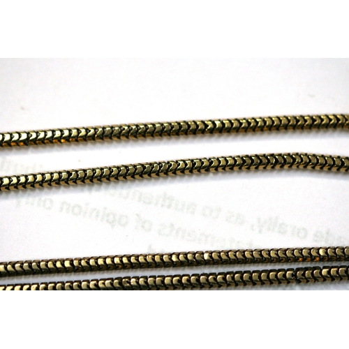 215 - A yellow metal (test as gold) snake skin link guard chain. Total length 168cm (66 ins).   36.8g