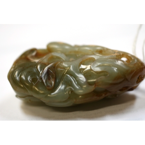 456 - A Chinese jade carving depicting gourds and foliage, 7cms (2.75ins) high.