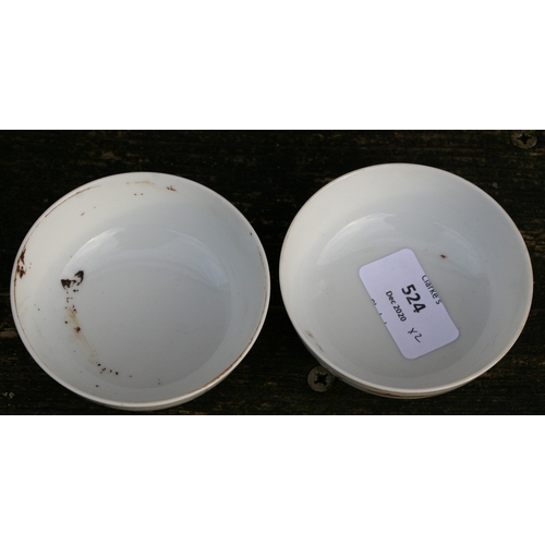 524 - A pair of Chinese porcelain wine cups decorated with butterflies, four character red mark to the und... 