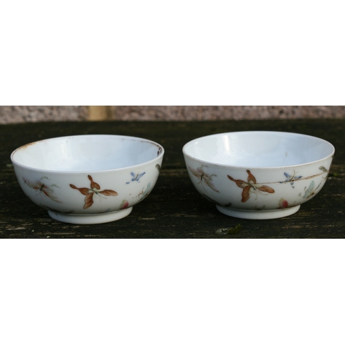 524 - A pair of Chinese porcelain wine cups decorated with butterflies, four character red mark to the und... 