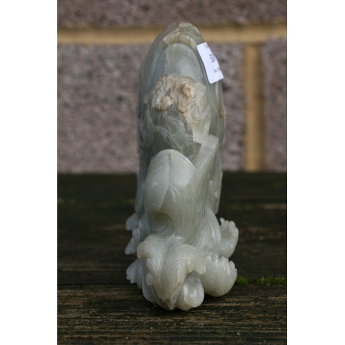 504 - A Chinese jade / hardstone boulder carved in the form of a stylised fish, 14cms (5.5ins) high.