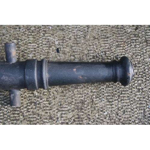 351 - A full size Cannon, having a cast iron barrel 84cms (33ins) long with an approximate Bore Diameter o... 