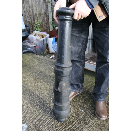 351 - A full size Cannon, having a cast iron barrel 84cms (33ins) long with an approximate Bore Diameter o... 