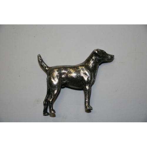 174 - A novelty silver pepper caster in the form of a standing hound, maker's mark for William Comyns & So... 