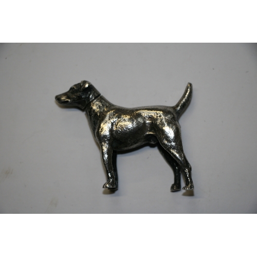 174 - A novelty silver pepper caster in the form of a standing hound, maker's mark for William Comyns & So... 