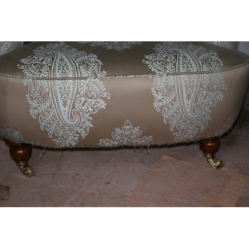 796 - A Howard style silk upholstered armchair.