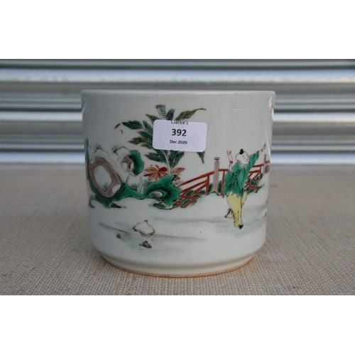 392 - A Chinese famille rose bitong brush pot decorated with figures. 14cm (5.5 ins) highCondition ReportT... 