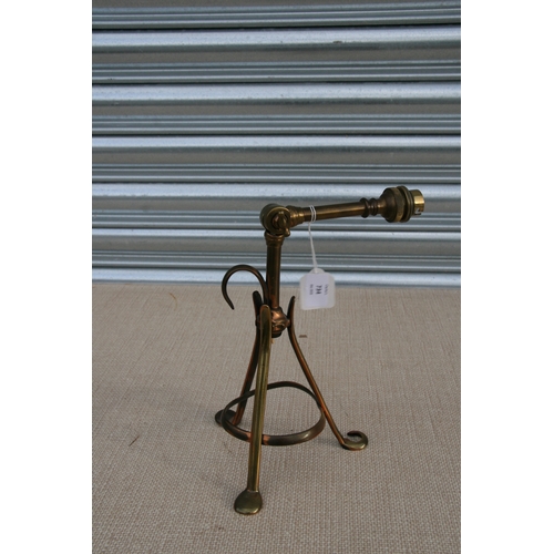 734 - A late 19th/early 20th century brass table lamp with adjustable arm in the style of W A S Benson, 38... 