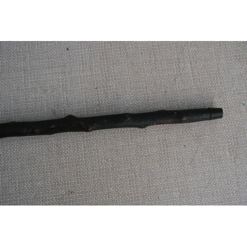 279 - A knotted wood (possibly Blackthorn) sword stick with tapering tapering steel blade. 85cm ( 33.5 ins... 