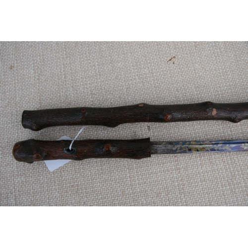 279 - A knotted wood (possibly Blackthorn) sword stick with tapering tapering steel blade. 85cm ( 33.5 ins... 