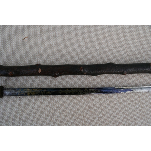 279 - A knotted wood (possibly Blackthorn) sword stick with tapering tapering steel blade. 85cm ( 33.5 ins... 