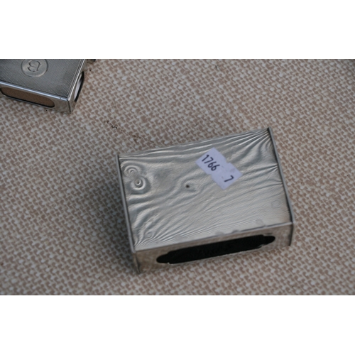 932 - A set of four silver matchbox covers, London 1903; together with a Chinese silver matchbox cover dec... 