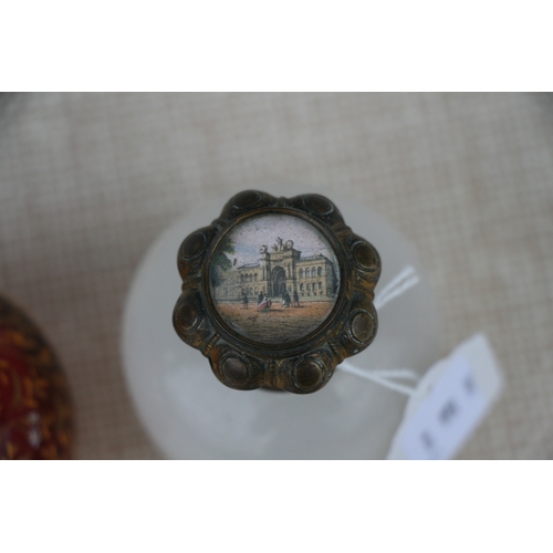 607 - A 19th century French opaline glass perfume bottle, the hinged lid inset with an image of a palace, ... 