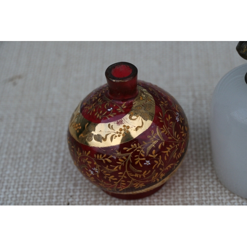 607 - A 19th century French opaline glass perfume bottle, the hinged lid inset with an image of a palace, ... 