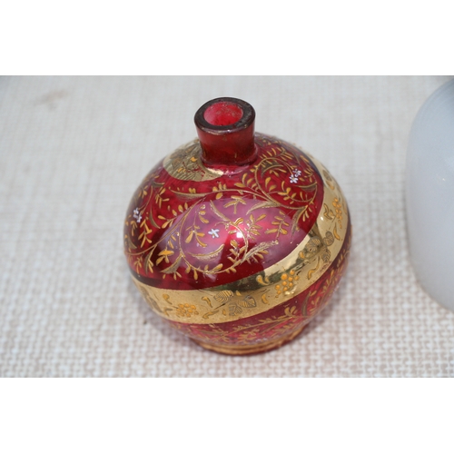 607 - A 19th century French opaline glass perfume bottle, the hinged lid inset with an image of a palace, ... 