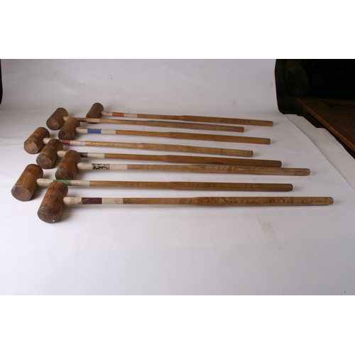 2 - A n early 20th century croquet set, cased,