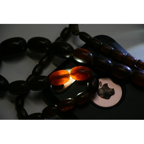 229 - A quantity of cherry amber bead necklaces to include four long necklaces, four faceted cherry amber ... 