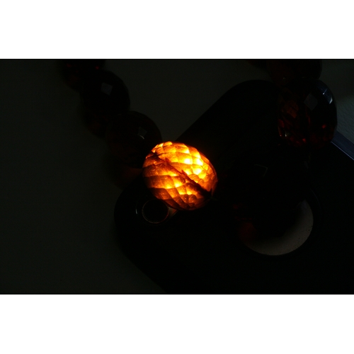 229 - A quantity of cherry amber bead necklaces to include four long necklaces, four faceted cherry amber ... 