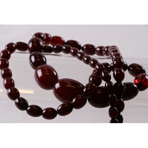 229 - A quantity of cherry amber bead necklaces to include four long necklaces, four faceted cherry amber ... 