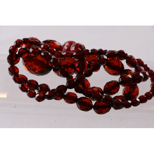 229 - A quantity of cherry amber bead necklaces to include four long necklaces, four faceted cherry amber ... 