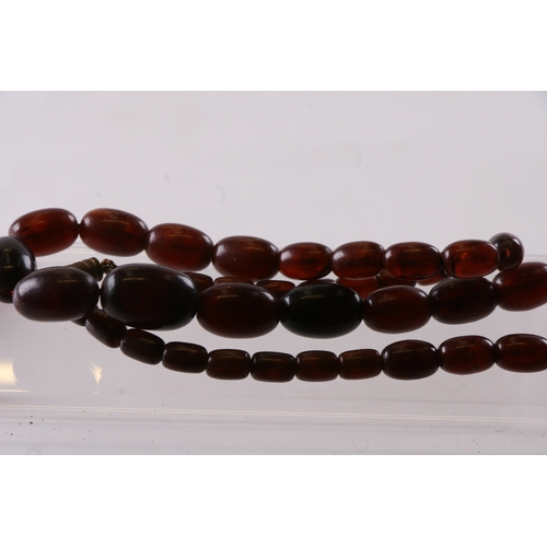 229 - A quantity of cherry amber bead necklaces to include four long necklaces, four faceted cherry amber ... 