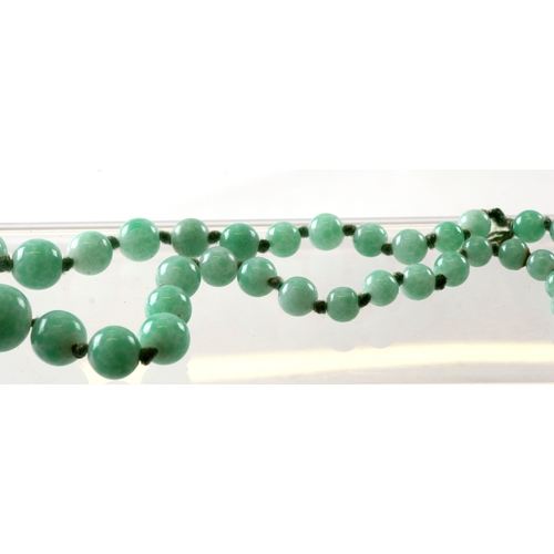 234 - A group of jade / hardstone necklaces; together with similar elephant figures.