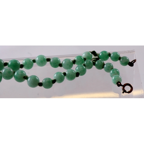 234 - A group of jade / hardstone necklaces; together with similar elephant figures.