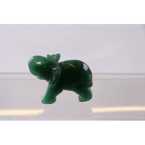 234 - A group of jade / hardstone necklaces; together with similar elephant figures.