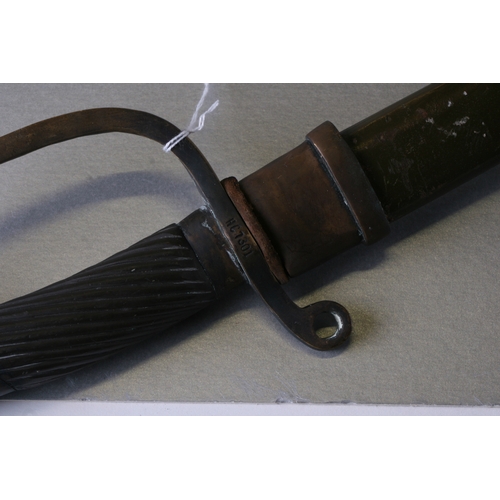 360 - A WWI period Russian sword and scabbard, the hilt numbered '7301', 101cms (39.75ins) long.