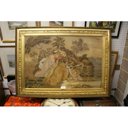 737 - An early 19th century silkwork picture depicting Moses in the bulrushes, framed & glazed, 67 by ... 