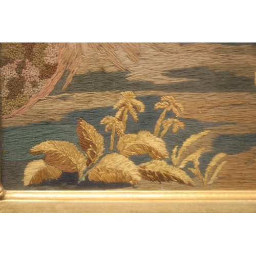 737 - An early 19th century silkwork picture depicting Moses in the bulrushes, framed & glazed, 67 by ... 