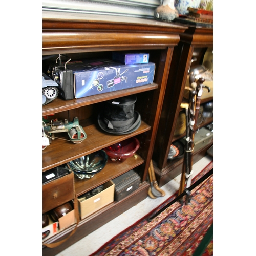 782 - A pair of figured walnut open bookcases with three adjustable shelves, on plinth bases, 160cms (63in... 