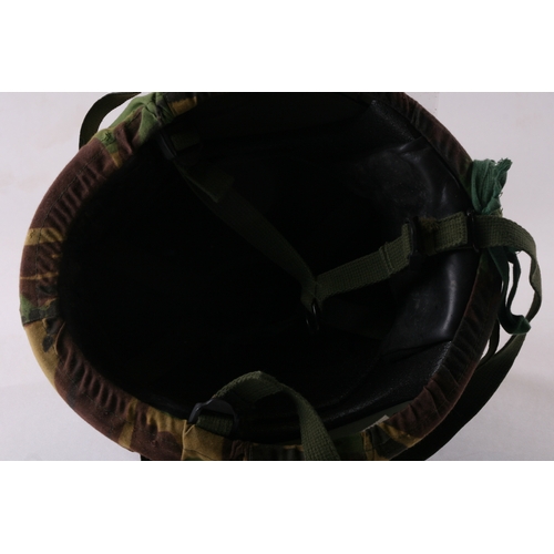 1052 - A Vietnam War period USA military helmet.