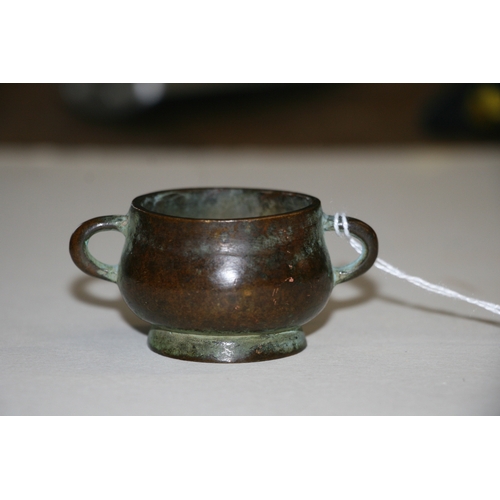 416 - A late 19th century Chinese miniature bronze censer with four character mark to base, 7.7cms (3ins) ... 