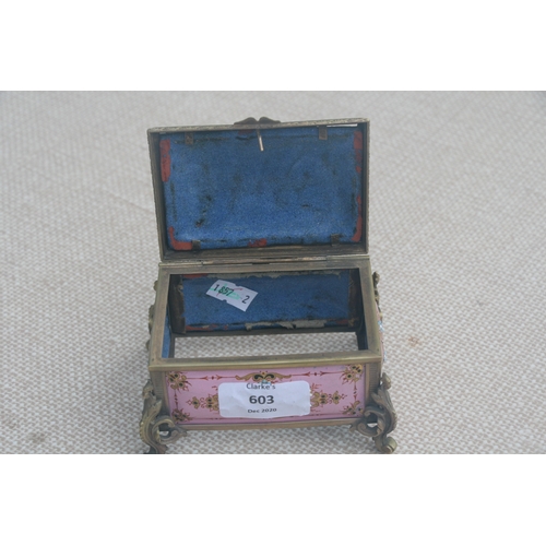 603 - A 19th century French enamel trinket box in the manner of Tahan of Paris, the pink ground with appli... 