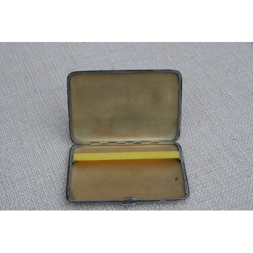 940 - A silver cigarette case, Birmingham 1932; together with another silver cigarette case, total weight ... 