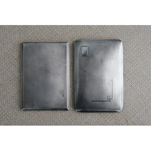 940 - A silver cigarette case, Birmingham 1932; together with another silver cigarette case, total weight ... 