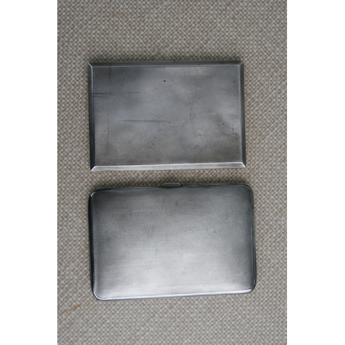 940 - A silver cigarette case, Birmingham 1932; together with another silver cigarette case, total weight ... 