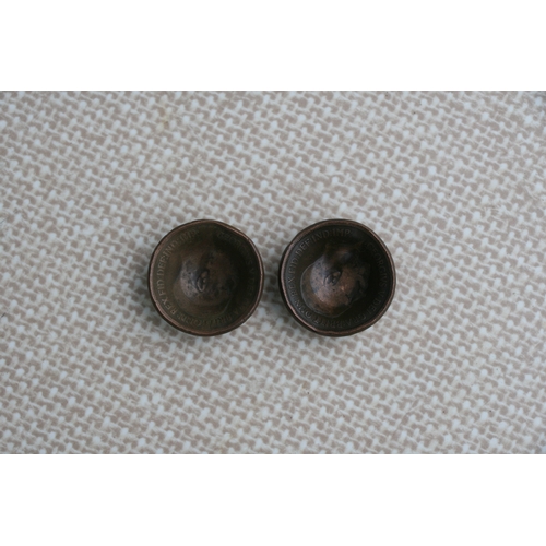 1066 - A set of five WW1 trench art Tommy helmets made from British pennies, one for each year of the Great... 