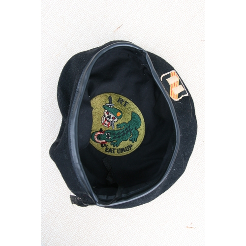 276 - Two Vietnam war period berets and cloth badges, to include Special Forces.