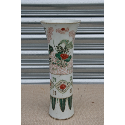 528 - A Chinese famille rose vase of slender flared form decorated with birds and flowers, 32cms 912.5ins)... 