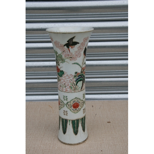 528 - A Chinese famille rose vase of slender flared form decorated with birds and flowers, 32cms 912.5ins)... 