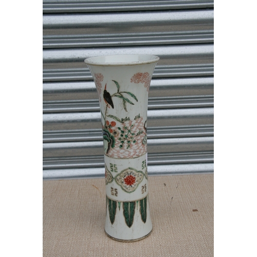 528 - A Chinese famille rose vase of slender flared form decorated with birds and flowers, 32cms 912.5ins)... 