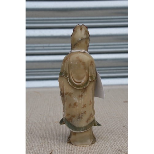 532 - An 18th / 19th century Chinese polychrome soapstone carving depicting Guanyin, 17cms (6.75ins) high.